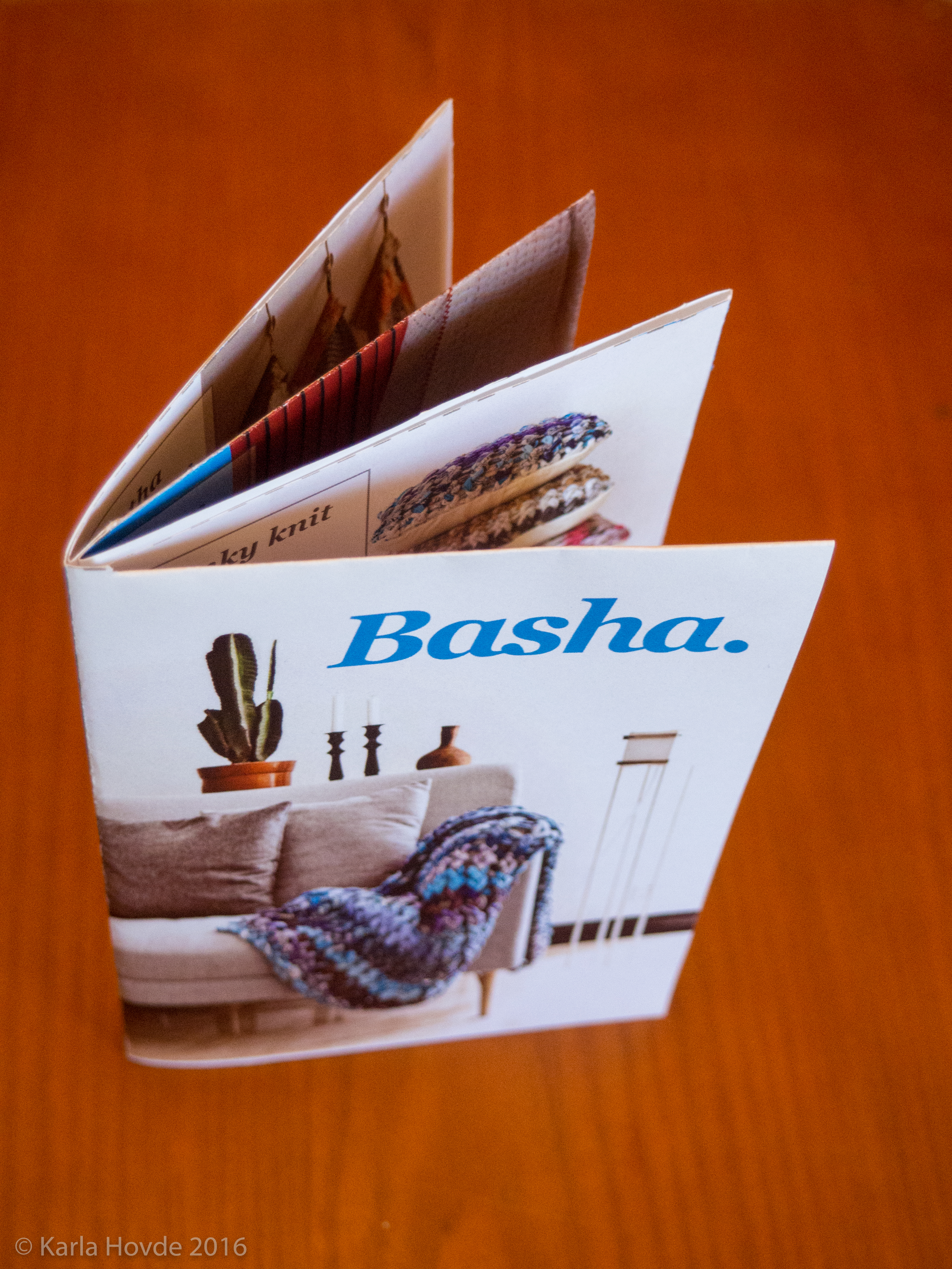 Photo of miniature Basha product catalogue made from one sheet of cleverly folded paper